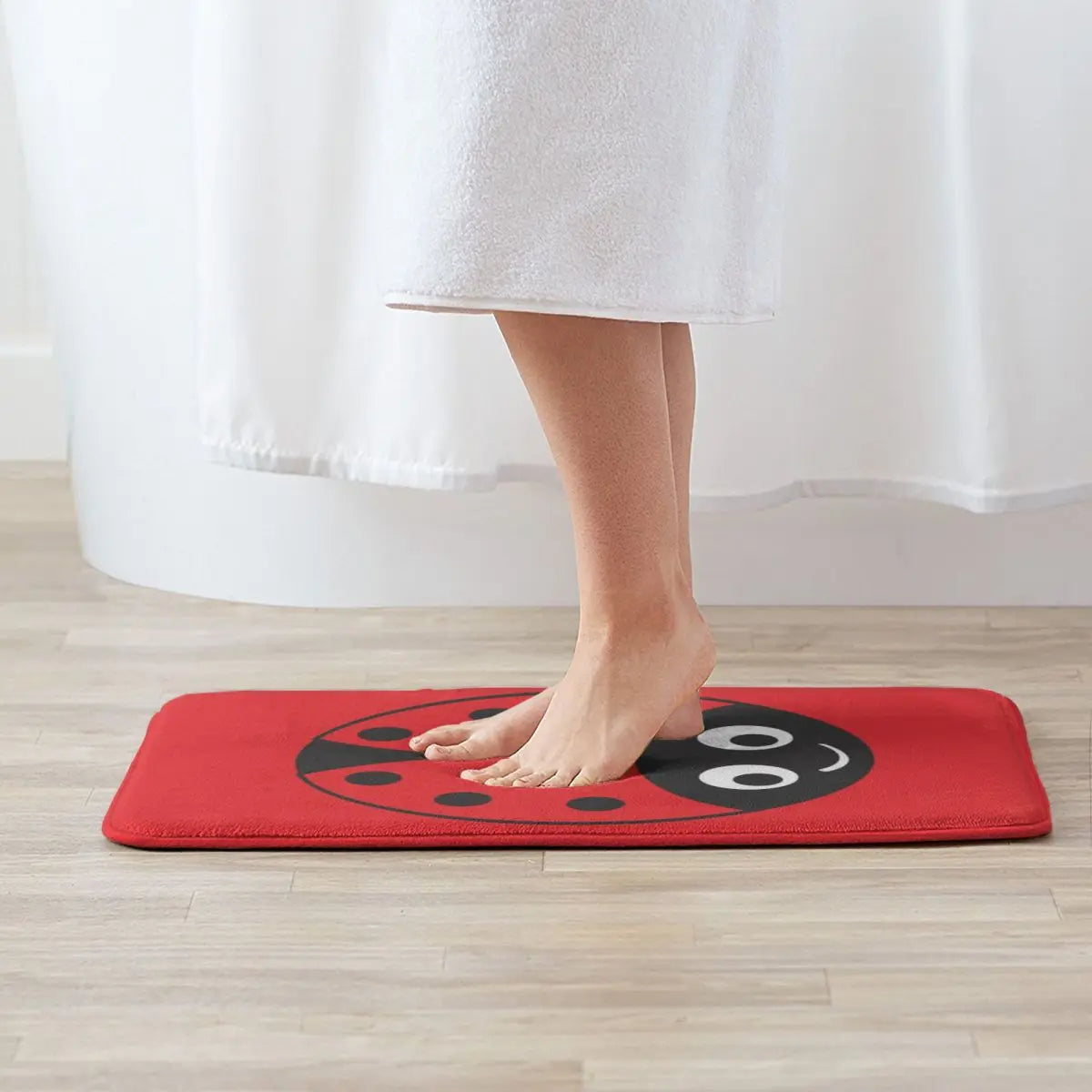Tapis de bain coccinelle