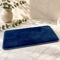 Tapis de bain bleu marine