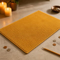 Tapis de bain jaune moutarde