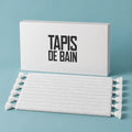 Tapis de bain pompon