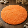 Tapis de bain rond orange