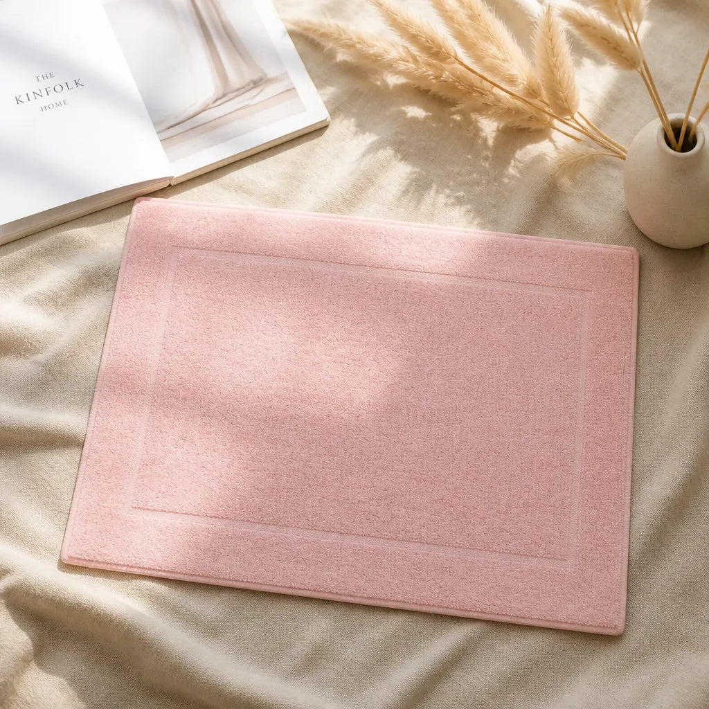 Tapis de bain rose poudré
