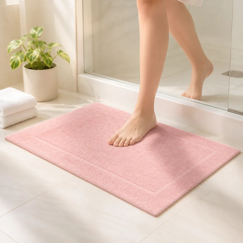 Tapis de bain rose poudre